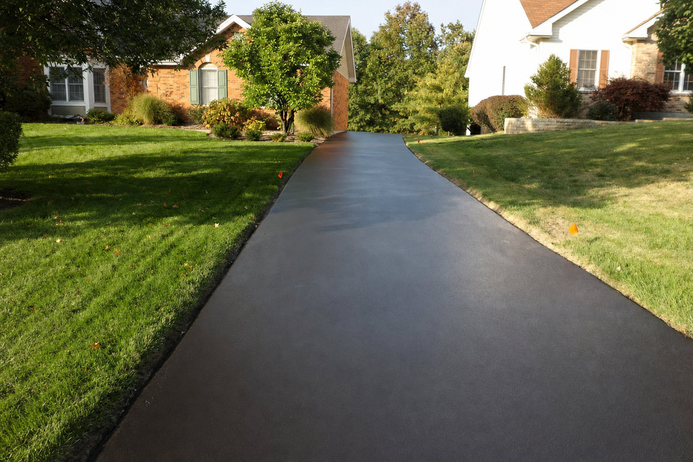 Asphalt sealcoating